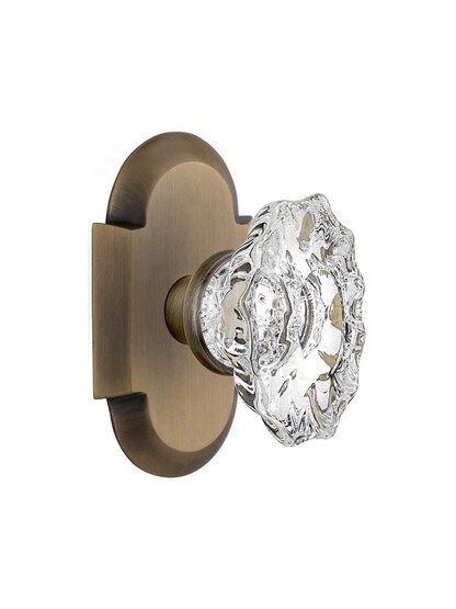 Arched Rosette Door Set with Chateau Crystal Glass Knobs in Antique Brass.